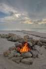 USA, Florida. Campfire on the beach Art Print